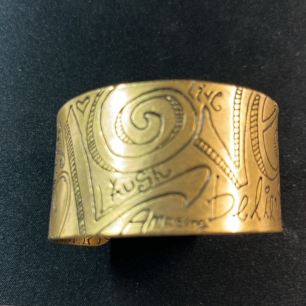 Chicos bronze color, metal cuff bracelet 6.5” round x 1.5” thick.